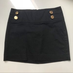 Express black mini skirt with gold buttons